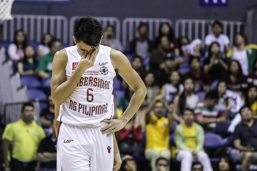 UP guard Jett Manuel reacts during the Fighting Maroons' game against the FEU Tamaraws. Tristan Tamayo/INQUIRER.net