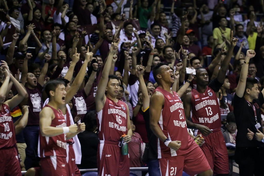 UP Maroons celebrate opening win. photo by Tristan Tamayo/INQUIRER.net 