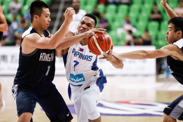 Jayson Castro flanked by opponents in Philippines vs Hongkong game. Photo from Fiba.com