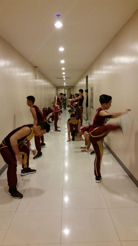 First to perform, first to stretch out #UPuso. Photo by Ruth Mayo/INQUIRER