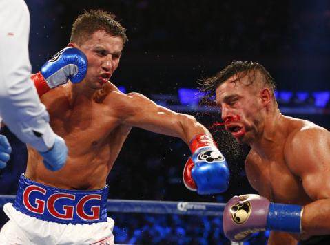  Gennady Golovkin, left, hits David Lemieux in the eighth round of a world middleweight title fight at Madison Square Garden in New York on Saturday, Oct. 17, 2015. Golovkin won by a TKO in the eighth round. AP