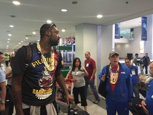 Gilas Pilipinas' naturalized center Andray Blatche (left), head coach Tab Baldwin and the rest of the Philippine team arrive at NAIA Monday morning after their silver-medal finish in the 2015 Fiba Asia Championship in Changsha, China. Ruel Perez/Radyo Inquirer