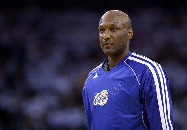 This Jan. 2, 2013 file photo shows Los Angeles Clippers' Lamar Odom (7) in action against the Golden State Warriors during an NBA basketball game in Oakland, Calif. Authorities say former NBA and reality TV star Odom has been hospitalized after he was found unconscious at a Nevada brothel. Nye County Sheriff Sharon A. Wehrly says the department got a call Tuesday afternoon, Oct. 13, 2015, requesting an ambulance for an unresponsive man at the Love Ranch in Crystal, Nevada about 70 miles outside of Las Vegas.  (AP Photo/Marcio Jose Sanchez, File)