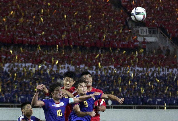 Philip Younghusband, second from left, and Misagh Bahadoran, second from right, of the Philippines compete against An Byong Jun, third from left, and Pak Kwang Ryong, right, of North Korea during their preliminary joint qualification round 2 soccer match for the 2018 FIFA World Cup and the 2019 AFC Asian Cup at the Kim Il Sung Stadium in Pyongyang, North Korea, Thursday, Oct. 8, 2015. (AP Photo/Jon Chol Jin)
