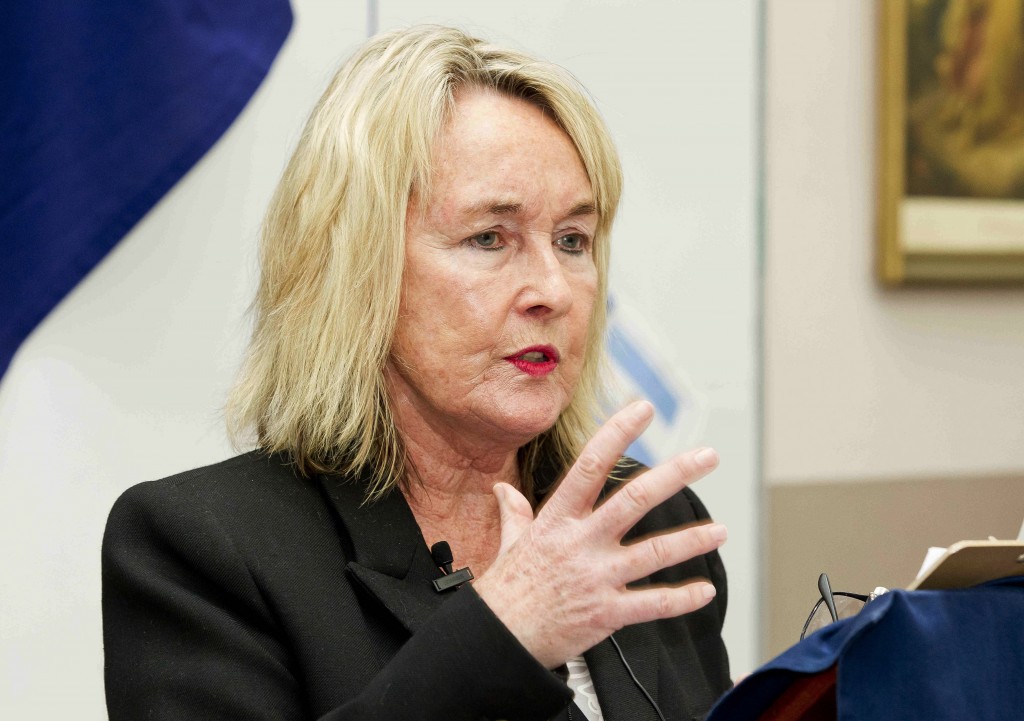 June Steenkamp, the mother of the late Reeva Steenkamp who was shot dead by her boyfriend Oscar Pistorius in 2013, delivers a lecture on women abuse to students at Saint Dominic's school in Port Elizabeth, South Africa, Wednesday, Oct. 21, 2015, where Reeve attended. Pistorius was released from prison into house arrest Monday Oct. 19, 2015, after serving one year out of five for the culpable homicide death of Reeva Steenkamp in Feb. 2013. (AP Photo/Michael Sheehan)