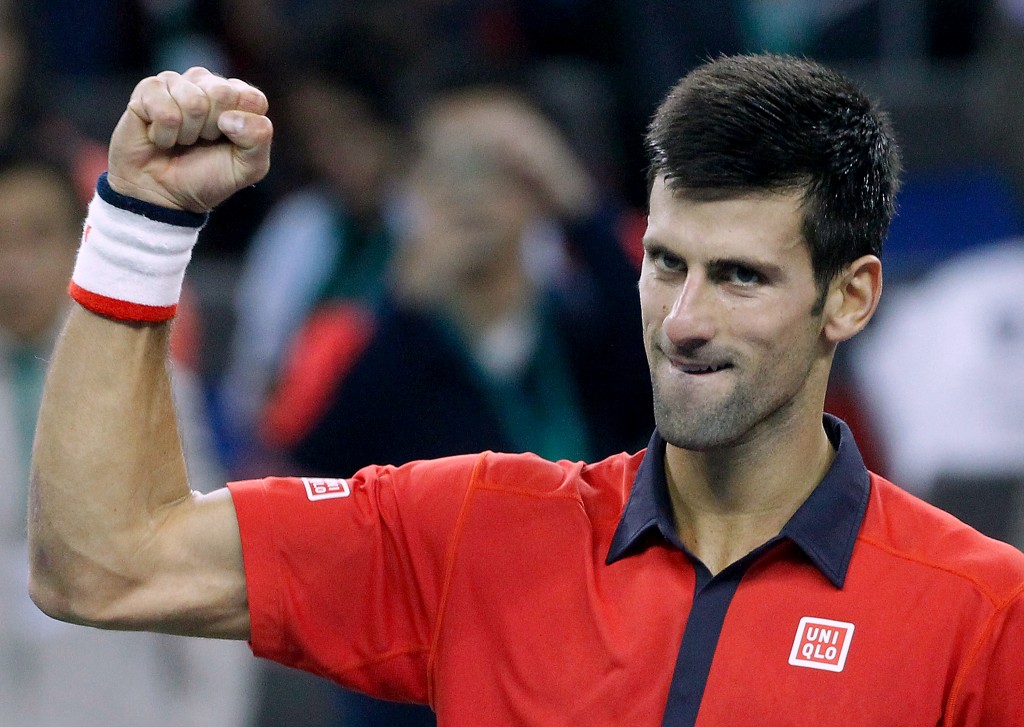 Novak Djokovic of Serbia celebrates after winning his semifinal match against Andy Murray of Britain in the Shanghai Masters tennis tournament in Shanghai, China, Saturday, Oct. 17, 2015. (AP Photo)