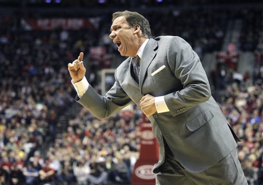 In this March 22, 2011, file photo, Washington Wizards head coach Flip Saunders shouts at an official in the second quarter of an NBA basketball game against the Portland Trail Blazers in Portland, Ore. Saunders, the longtime NBA coach who won more than 650 games in nearly two decades and was trying to rebuild the Minnesota Timberwolves as team president, coach and part owner, died Sunday, Oct. 25, 2015, the team said. He was 60. AP FILE PHOTO
