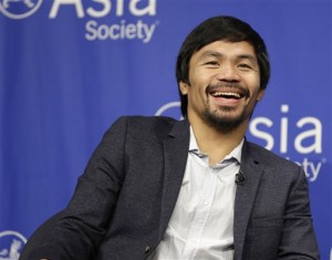 Manny Pacquiao takes questions at the Asia Society in New York, Monday, Oct. 12, 2015. Pacquiao will be honored by the society as the Asia Game Changer of the Year. AP Photo