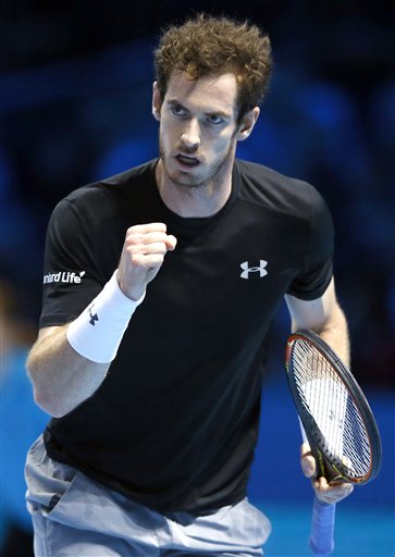 Andy Murray of Britain celebrates winning a point after he played a return to David Ferrer of Spain during their singles tennis match at the ATP World Tour Finals at the O2 Arena in London, Monday, Nov. 16, 2015. (AP Photo/Kirsty Wigglesworth)