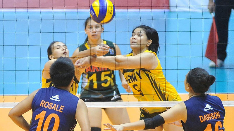 JOVELYN Gonzaga (left) and Michelle Carolino try to keep the ball in play for Army. AUGUST DELA CRUZ
