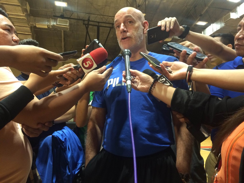 : Tab Baldwin answers questions from the media following Gilas pool's first training Monday night at Meralco gym. Mark Giongco/INQUIRER.net
