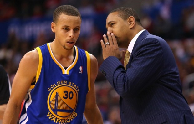 FILE—Head coach Mark Jackson and Stephen Curry #30 of the Golden State Warriors confer in the game with the Los Angeles Clippers at Staples Center on October 31, 2013 in Los Angeles, California. The Clippers won 126-115. Stephen Dunn/Getty Images/AFP