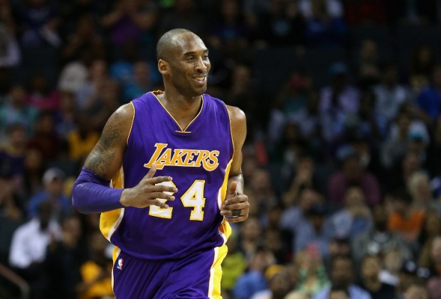 CHARLOTTE, NC - DECEMBER 28: Kobe Bryant #24 of the Los Angeles Lakers reacts as he runs up the court during their game against the Charlotte Hornets at Time Warner Cable Arena on December 28, 2015 in Charlotte, North Carolina. NOTE TO USER: User expressly acknowledges and agrees that, by downloading and or using this photograph, User is consenting to the terms and conditions of the Getty Images License Agreement.   Streeter Lecka/Getty Images/AFP