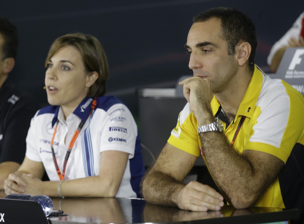 Renault sport managing director Cyril Abiteboul , right, is flanked by Williams deputy team principal Claire Williams as they attend a news conference at the Yas Marina racetrack in Abu Dhabi, United Arab Emirates, Friday, Nov. 27, 2015. The Emirates Formula One Grand Prix will take place on Sunday. (AP Photo/Luca Bruno)