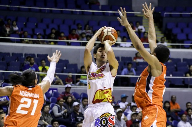 Jeff Chan shoots a jumper as two Meralco players try to put up a challenge. Photo by Tristan Tamayo/INQUIRER.net