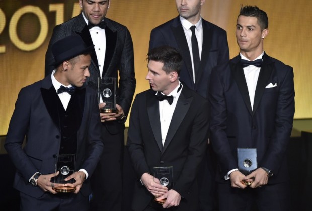 (From L) Brazil and FC Barcelona forward Neymar, Brazil and FC Barcelona defender Dani Alves, Argentina and FC Barcelona forward Lionel Messi, and Portugal and Real Madrid forward Cristiano Ronaldo pose on stage after being selected in the 2015 FIFA FIFPro World XI during the 2015 FIFA Ballon d'Or award ceremony at the Kongresshaus in Zurich on January 11, 2016. AFP PHOTO FABRICE COFFRINI / AFP / FABRICE COFFRINI