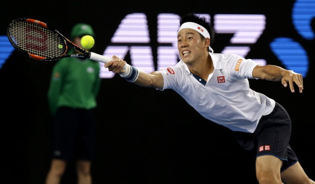 Kei Nishikori of Japan reaches for a forehand return to Austin Krajicek of the United States during their second round match at the Australian Open tennis championships in Melbourne, Australia, Wednesday, Jan. 20, 2016.(AP Photo/Aaron Favila)