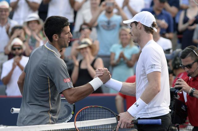 Andy Murray, right, of Britain, shakes hands with his opponent, Novak Djokovic, of Serbia, after defeating him in the men's final at the Rogers Cup tennis tournament in Montreal on Sunday, Aug. 16, 2015. AP/The Canadian Press