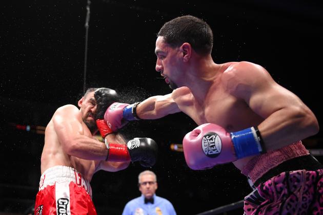 Danny Garcia, right, throws a punch at Robert Guerrero during their WBC championship welterweight bout, Saturday, Jan. 23, 2016, in Los Angeles. AP