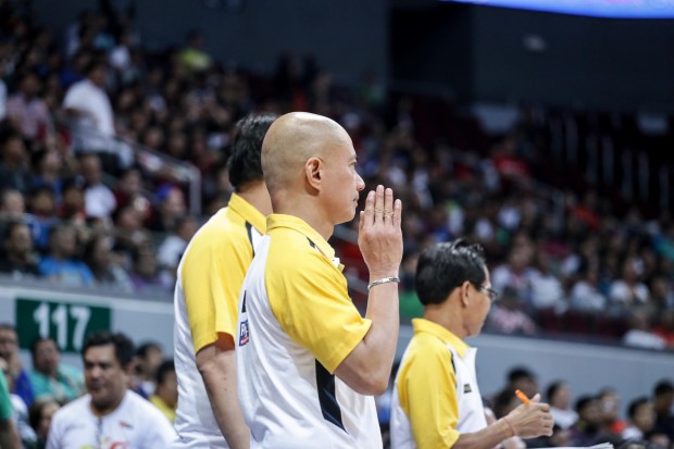 Yeng Guiao doing his version of the "Pabebe Wave." Photo by Tristan Tamayo/INQUIRER.net