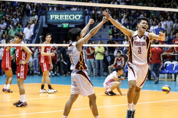 The Perpetual Help Altas celebrate their championship as the EAC Generals looked on. Photo by Tristan Tamayo/INQUIRER.net