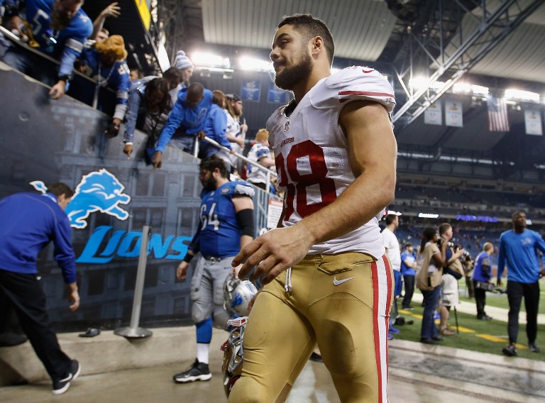 DETROIT, MI - DECEMBER 27: Jarryd Hayne #38 of the San Francisco 49ers walks off the field after losing 17-32 to the Detroit Lions at Ford Field on December 27, 2015 in Detroit, Michigan.   Gregory Shamus/Getty Images/AFP