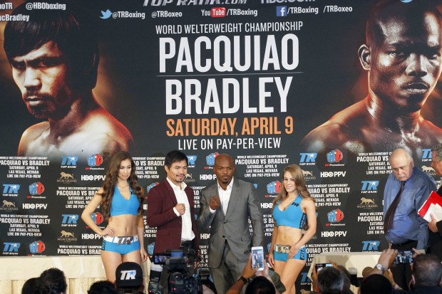 Manny Pacquiao, center left, and Timothy Bradley Jr. pose during a news conference in Beverly Hills, Calif., on Tuesday, Jan. 19, 2016. Pacquiao and Bradley are scheduled to fight on April 9 in Las Vegas for Bradley's WBO welterweight title. (AP Photo/Nick Ut)