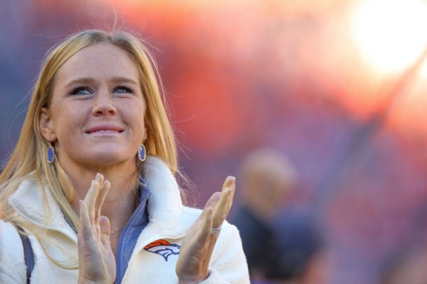 Mixed martial artist Holly Holm, who competes in the Ultimate Fighting Championship bantamweight division, looks on during a game between the Denver Broncos and the San Diego Chargers at Sports Authority Field at Mile High on January 3, 2016 in Denver, Colorado.   Justin Edmonds/Getty Images/AFP