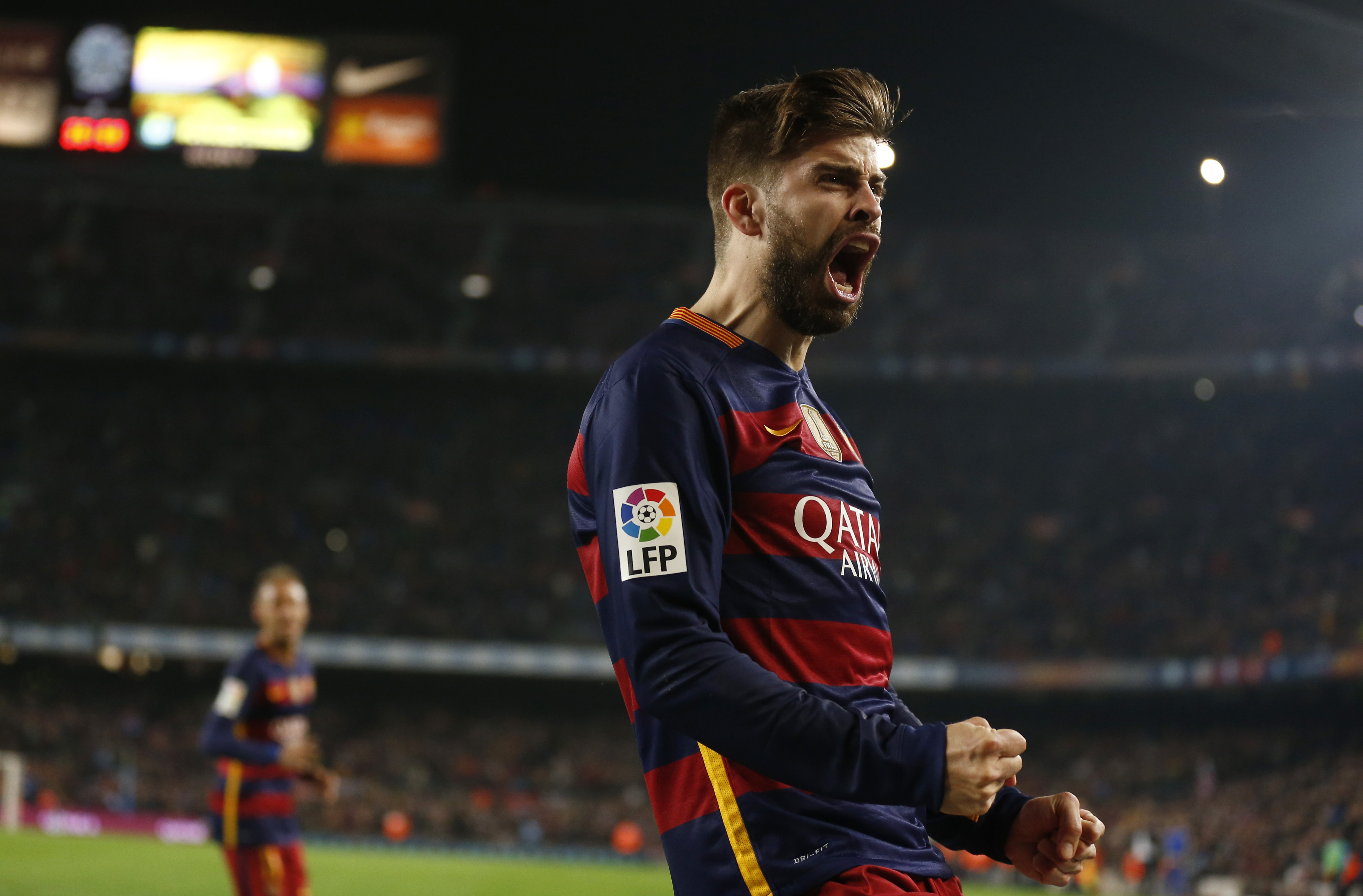 FC Barcelona's Gerard Pique reacts after scoring against Athletic Bilbao scored during a quarterfinal, second leg, Copa del Rey soccer match at the Camp Nou stadium in Barcelona, Spain, Wednesday, Jan. 27, 2016. AP File photo.
