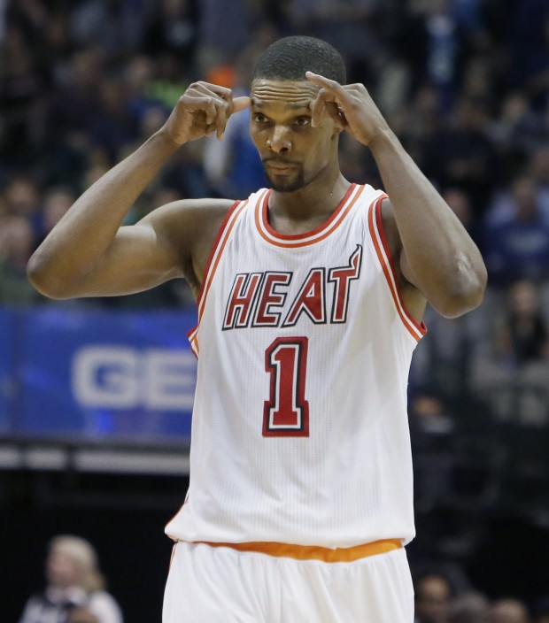 Miami Heat forward Chris Bosh reacts to a call during the second half of the team's NBA basketball game against the Dallas Mavericks on Wednesday, Feb. 3, 2016, in Dallas. AP