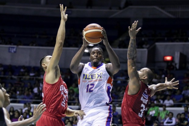 FILE–NLEX import Al Thornton vs two defenders. Photo by Tristan Tamayo/INQUIRER.net