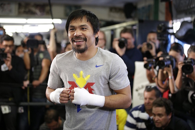 Manny Pacquiao, of the Philippines, smiles during a workout Wednesday, April 15, 2015, in Los Angeles. Pacquiao is scheduled to fight Floyd Mayweather Jr. in a welterweight boxing match in Las Vegas on May 2. AP