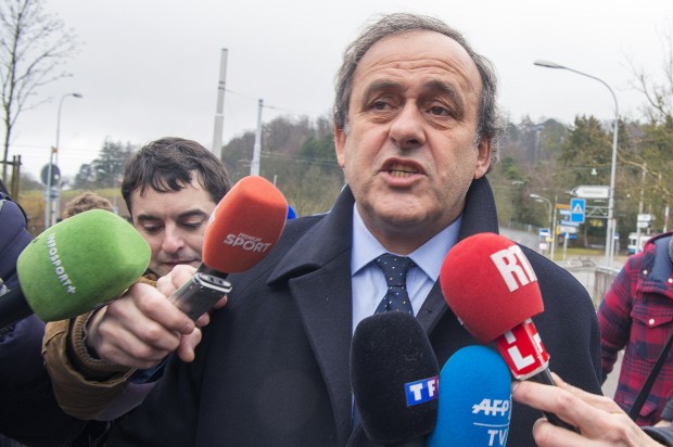 Suspended  UEFA President Michel Platini arrives at the FIFA Headquarters  in Zurich, Switzerland, Monday, Feb.  15, 2016. Michel Platini's appeal against his eight-year ban from all football-related activity will be heard by FIFA's appeals committee today.  (Walter Bieri/Keystone via AP)