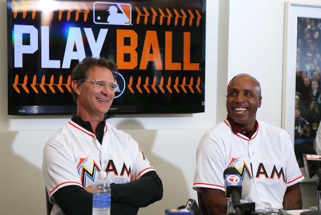 Miami Marlins manager Don Mattingly,left, and hitting coach Barry Bond speaking with the media during the baseball team's FanFest at Marlins Park on Saturday, Feb. 20, 2016 in Miami. El Nuevo Herald/AP
