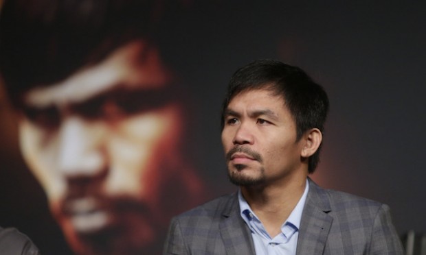 Manny Pacquiao listens during a news conference to promote an upcoming boxing match Thursday, Jan. 21, 2016, in New York. Pacquiao is scheduled to fight Timothy Bradley on April 9, 2016,  in Las Vegas.  AP