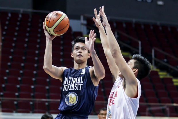 John Clemente  vs Red Cubs defender.   photo by Tristan Tamayo/INQUIRER.net
