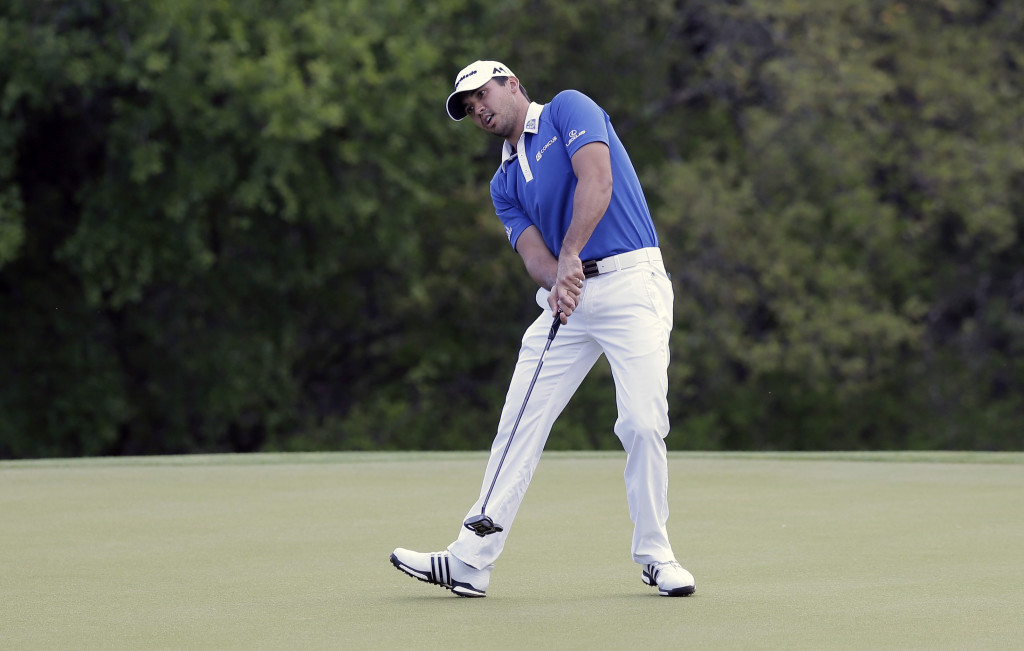 Jason Day, of Australia, reacts to missing a putt on the first hole during the semifinal final round against Rory McIlroy, of Northern Ireland, at the Dell Match Play Championship golf tournament at Austin County Club, Sunday, March 27, 2016, in Austin, Texas. (AP Photo/Eric Gay)