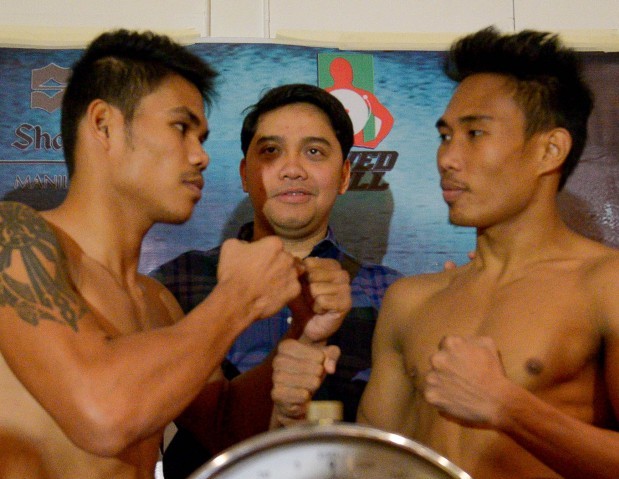 Roberto Gonzalez, Saved by the Bell promoter Elmer Anuran, and Arjan Canillas pose for the camera after the weighing for the Vacant Gab R.P Lightweight Championship of Saved by the Bell Boxing Promotions at Shangri La Edsa, MAndaluyong City. Eloisa Lopez/PDI