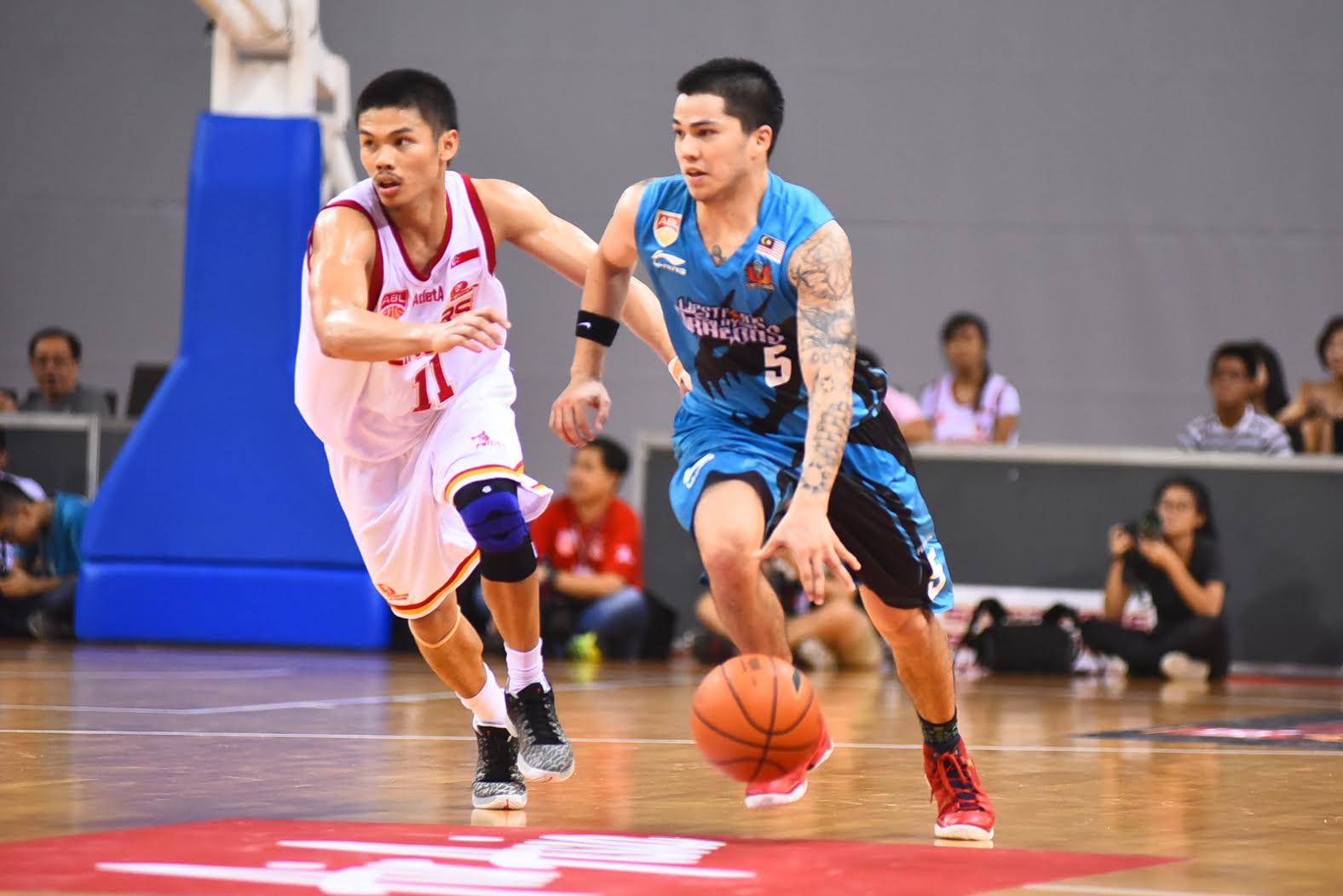 Fil-American guards Jason Brickman and Kris Rosales defending each other. Photo by Kuk Thew/ABL 