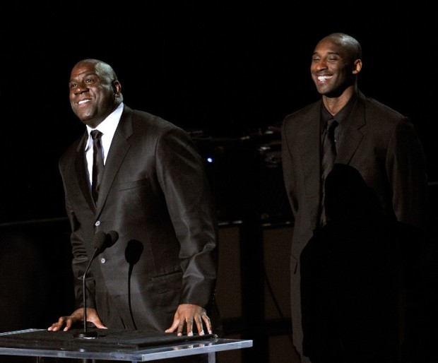 FILE--- Basketball players Earvin "Magic" Johnson Jr. (L) and Kobe Bryant speak at the Michael Jackson public memorial service held at Staples Center on July 7, 2009 in Los Angeles, California. Jackson, 50, the iconic pop star, died at UCLA Medical Center after going into cardiac arrest at his rented home on June 25 in Los Angeles, California.   Kevork Djansezian/Getty Images/AFP