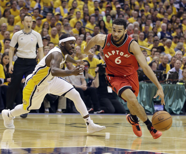 Toronto Raptors' Cory Joseph (6) goes to the basket against Indiana Pacers' Ty Lawson (10) during the first half of Game 6 of an NBA first-round playoff basketball series Friday, April 29, 2016, in Indianapolis. (AP Photo/Darron Cummings)