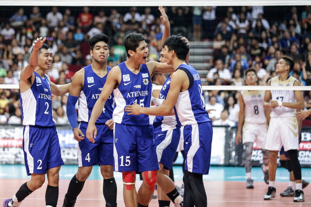 The Ateneo Blue Spikers celebrate after getting a point in Game 2 of the UAAP Men's Volleyball Finals. Led by Marck Espejo (2nd from right) and Ysay Marasigan (right), the Blue Spikers notched their second straight UAAP title. TRISTAN TAMAYO/INQUIRER.net