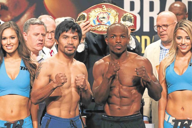 LAST TANGO IN VEGAS  Boxing icon Manny Pacquiao, in probably the last time he will be doing this, poses with opponent Timothy Bradley following their weigh-in for today’s fight. REM ZAMORA/CAFE PURO