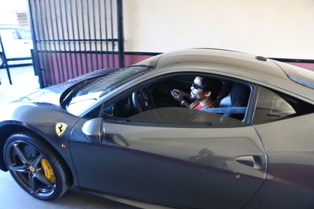 FILE -- Manny Pacquiao leaves Wild Card Gym aboard his Ferrari. Photo by Rem Zamora/INQUIRER