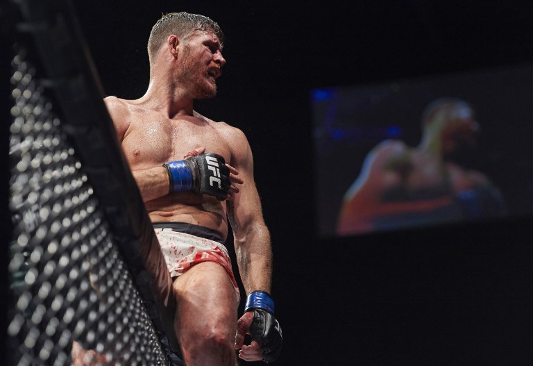 British fighter Michael Bisping celebrates after his fight with Anderson Silva of Brazil (not pictured) in their middleweight bout at the Ultimate Fighting Championship (UFC) Fight Night event in London on February 27, 2016. AFP File photo