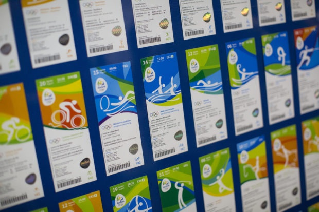 Olympic tickets are displayed during an event at the Rio 2016 headquarters in Rio de Janeiro, Brazil, Friday, May 20, 2016. Rio Olympic organizers unveiled their ticket design on Friday. (AP Photo/Felipe Dana)