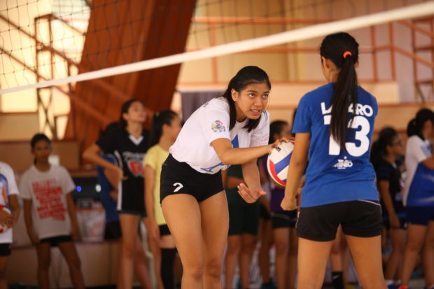 Alyssa Valdez assists a volleyball fan during her volleyball camp. CONTRIBUTED PHOTO