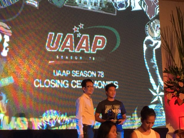Queeny Sabobo receives her Athlete of the Year award during the UAAP's closing ceremonies for its 78th season at UP's Bahay ng Alumni 