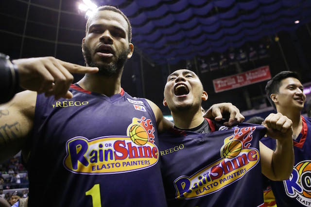 Rain or Shine import Pierre Henderson-Niles, left, hugs teammate and Finals MVP Paul Lee after the Elasto Painters won the 2016 PBA Commissioner's Cup crown Wednesday night, May 18, 2016, at Smart Araneta Coliseum. Tristan Tamayo/INQUIRER.net