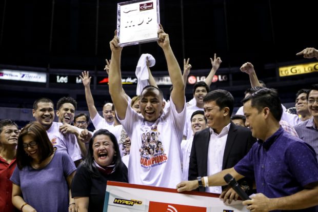 Paul Lee celebrates with teammates after winning the PBA Commissioner's Cup championship. Photo by Tristan Tamayo/INQUIRER.net